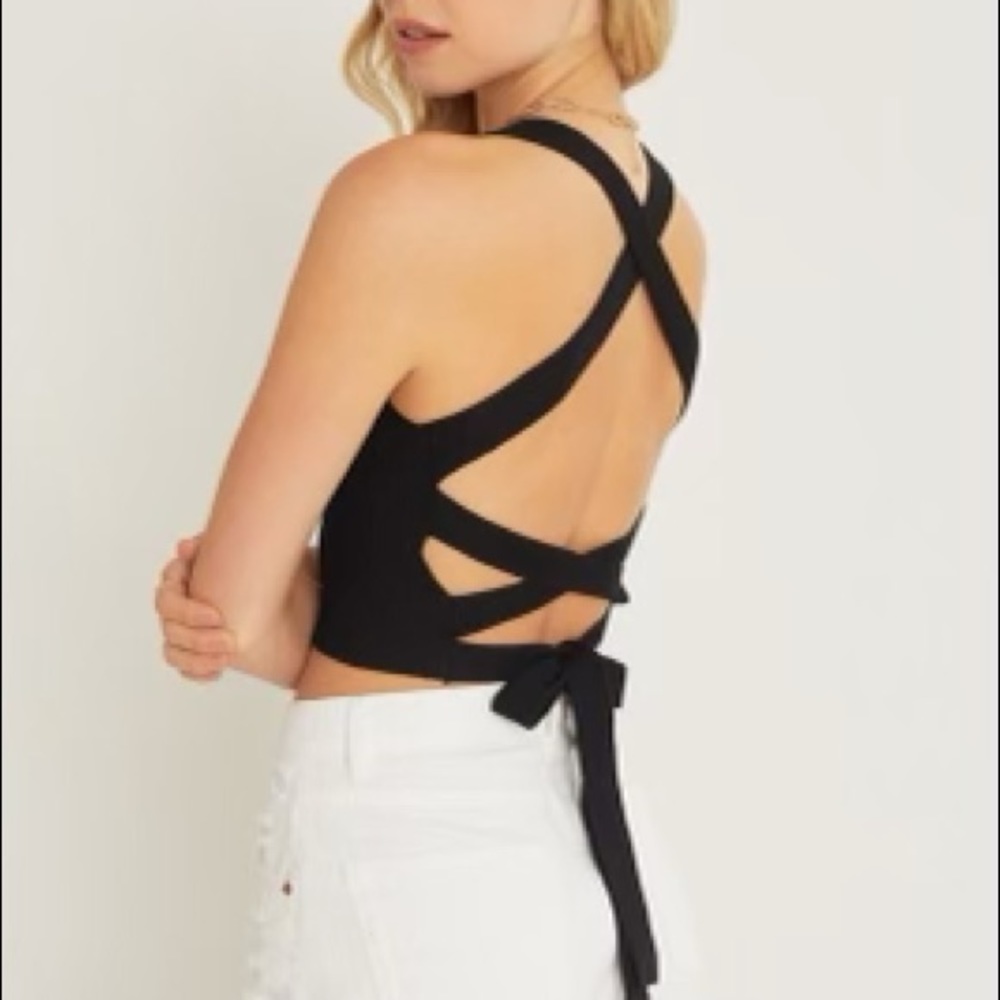 Black sweater top, with tie back detail.